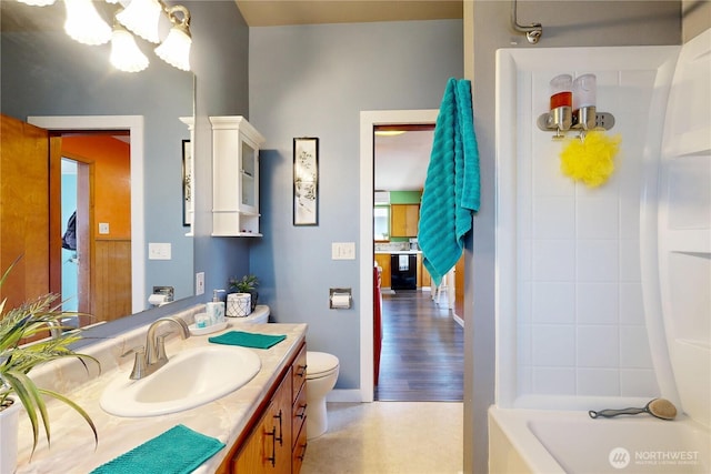 138 SE 5th Ave, Milton-Freewater, OR 97862 - full bath featuring vanity, toilet, a chandelier, and  shower combination