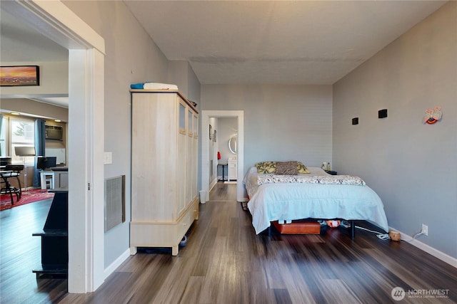 138 SE 5th Ave, Milton-Freewater, OR 97862 - bedroom featuring wood finished floors and baseboards