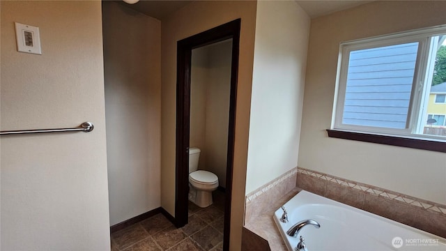 704 7th Ave SW, Tumwater, WA 98512 - full bath with a bath and toilet