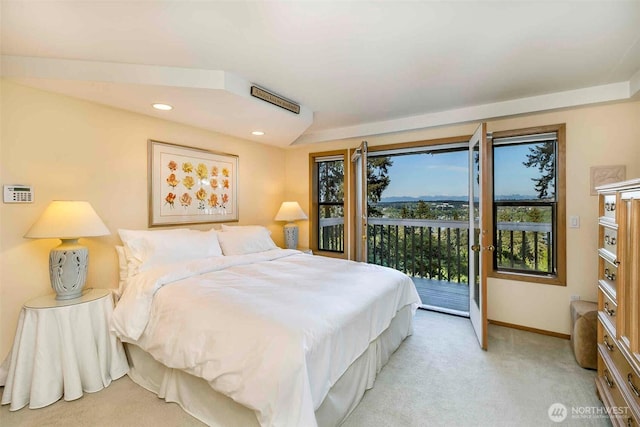 bedroom featuring access to exterior, baseboards, light carpet, and recessed lighting