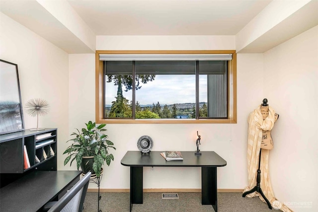 office area with carpet flooring and baseboards