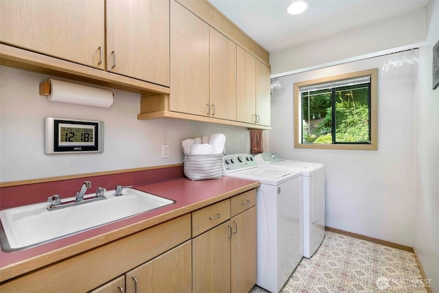 washroom featuring cabinet space, washing machine and dryer, baseboards, and recessed lighting