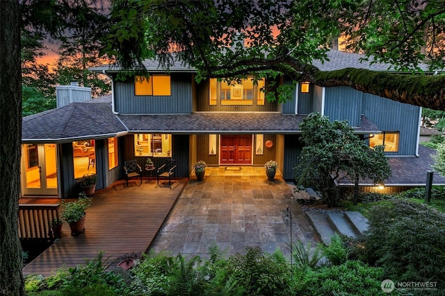 4741 Fernridge Ln, Mercer Island, WA 98040 - back of property featuring a shingled roof and a chimney