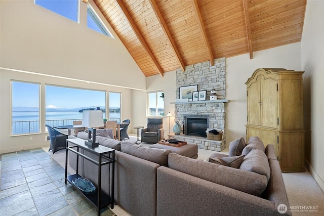 250 Fay Ln, Camano Island, WA 98282 - living room with beam ceiling, a fireplace, high vaulted ceiling, wooden ceiling, and a water view