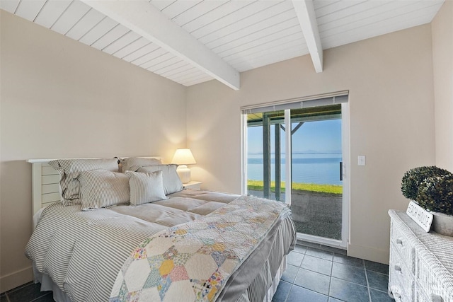 250 Fay Ln, Camano Island, WA 98282 - bedroom with access to outside, beam ceiling, baseboards, dark tile patterned floors, and a water view