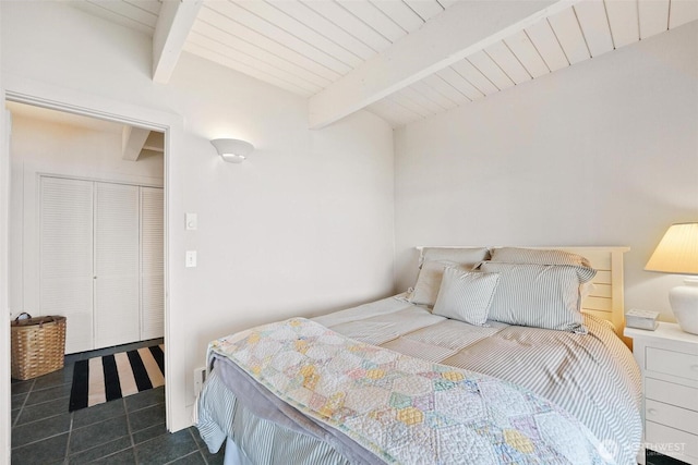250 Fay Ln, Camano Island, WA 98282 - tiled bedroom featuring wood ceiling and beam ceiling