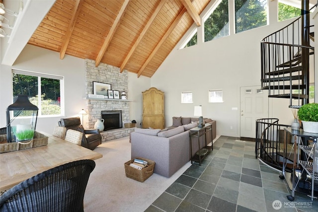 250 Fay Ln, Camano Island, WA 98282 - living room featuring beam ceiling, a wealth of natural light, high vaulted ceiling, and wooden ceiling