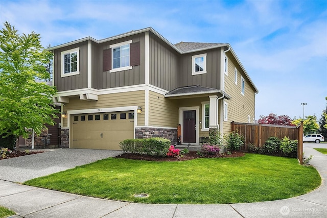 3908 187th Pl SE, Bothell, WA 98012 - view of front of house with board and batten siding, driveway, stone siding, and a garage