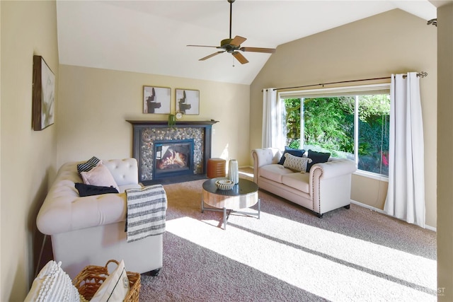carpeted living room with a ceiling fan, lofted ceiling, and a fireplace