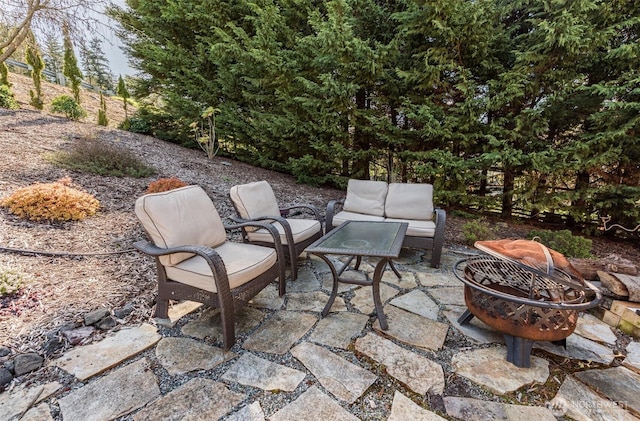 1573 Doe Run Rd, Sequim, WA 98382 - view of patio with an outdoor living space with a fire pit