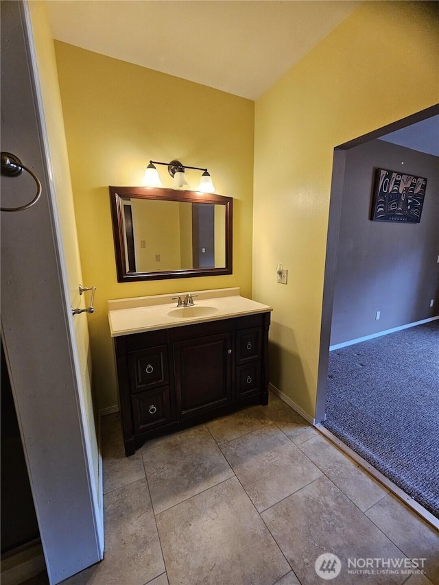 8 Calder Rd, Elma, WA 98541 - bathroom featuring vanity, baseboards, and tile patterned flooring