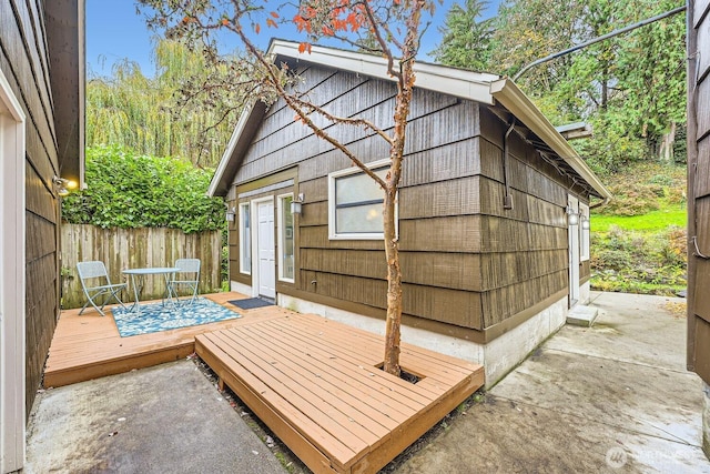 view of outdoor structure with fence
