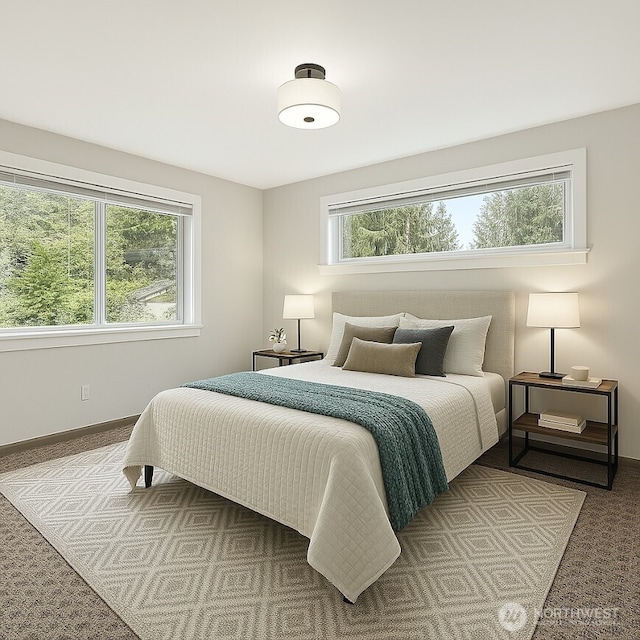 bedroom featuring baseboards, multiple windows, and carpet flooring