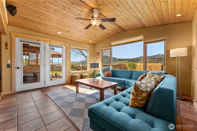 sunroom featuring a mountain view