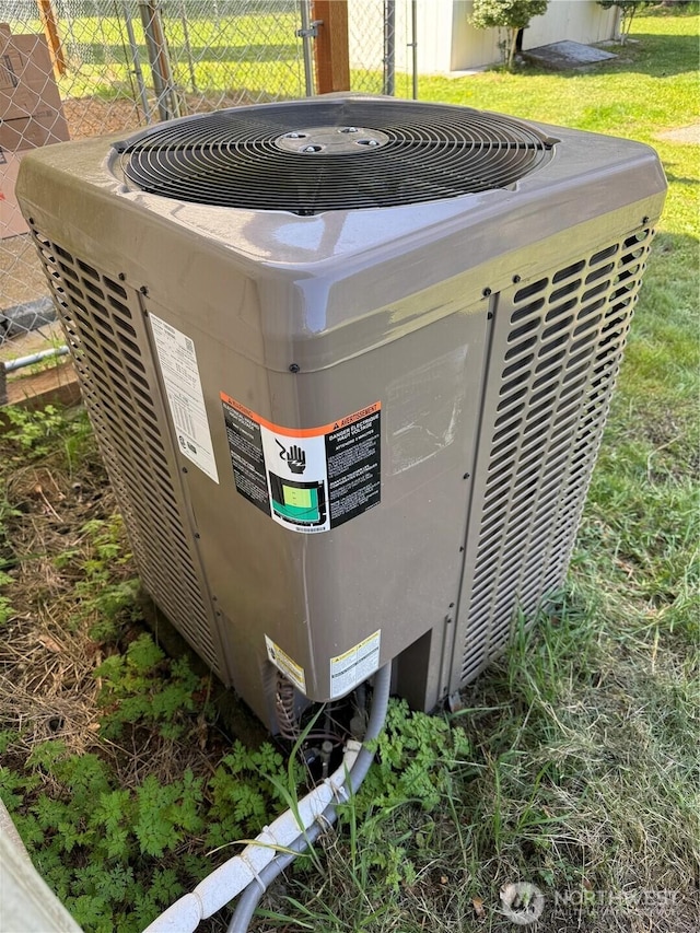 details with fence and cooling unit