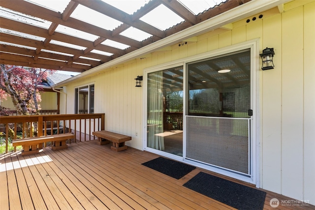 wooden terrace with a pergola