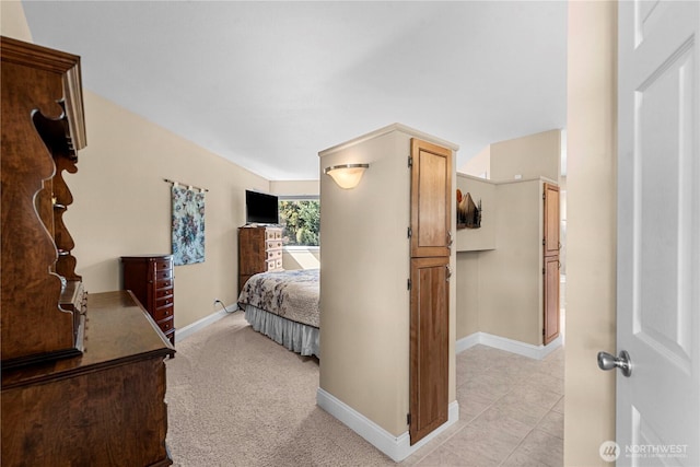 bedroom featuring baseboards