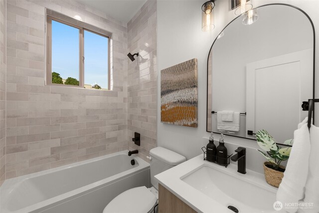 full bathroom with toilet, bathing tub / shower combination, and vanity
