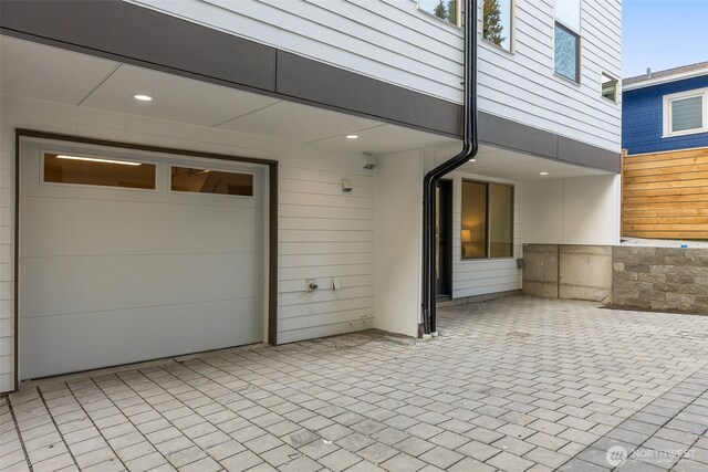 view of patio with a garage