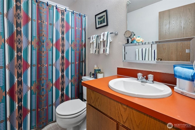 1123 N Whitman, Tacoma, WA 98406 - full bathroom with toilet, a shower with curtain, a textured wall, and vanity
