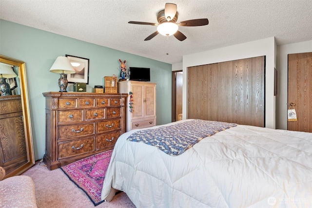 1123 N Whitman, Tacoma, WA 98406 - carpeted bedroom featuring a textured ceiling, a ceiling fan, and a closet