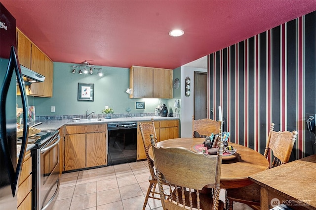 1123 N Whitman, Tacoma, WA 98406 - kitchen featuring stainless steel electric range oven, under cabinet range hood, light countertops, dishwasher, and a sink