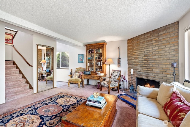 1123 N Whitman, Tacoma, WA 98406 - carpeted living area featuring stairway, a textured ceiling, and a brick fireplace