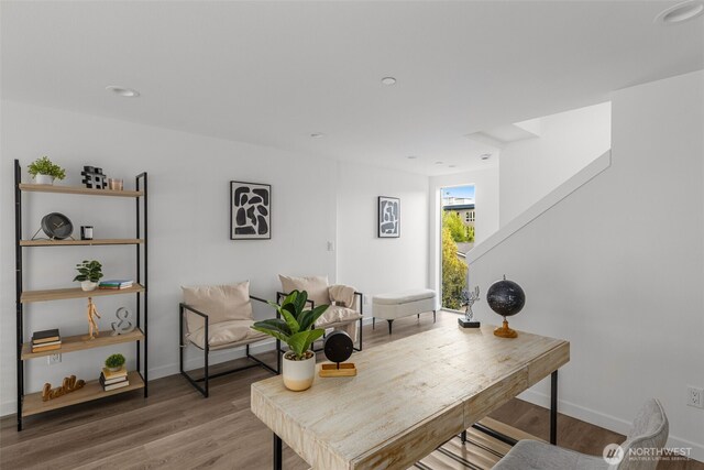 home office with wood finished floors, baseboards, and recessed lighting
