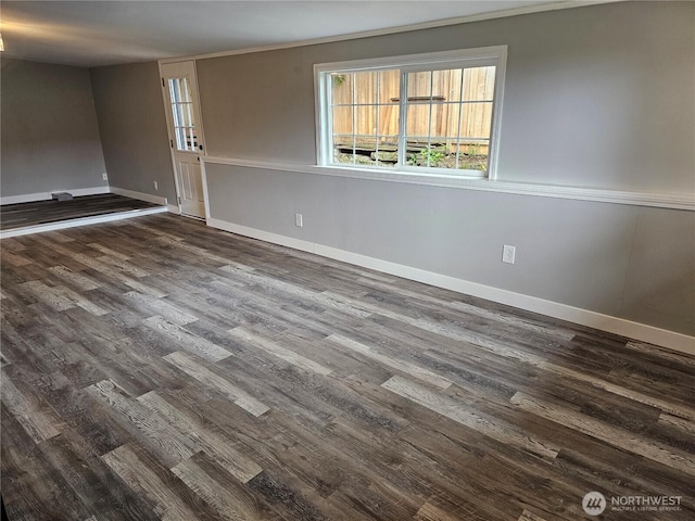 16738 2nd Ave NE, Shoreline, WA 98155 - unfurnished room with dark wood-type flooring and baseboards