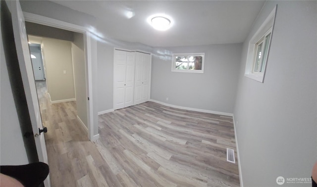 16738 2nd Ave NE, Shoreline, WA 98155 - basement featuring light wood-style flooring and baseboards