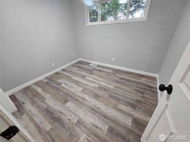 16738 2nd Ave NE, Shoreline, WA 98155 - unfurnished room featuring wood finished floors and baseboards