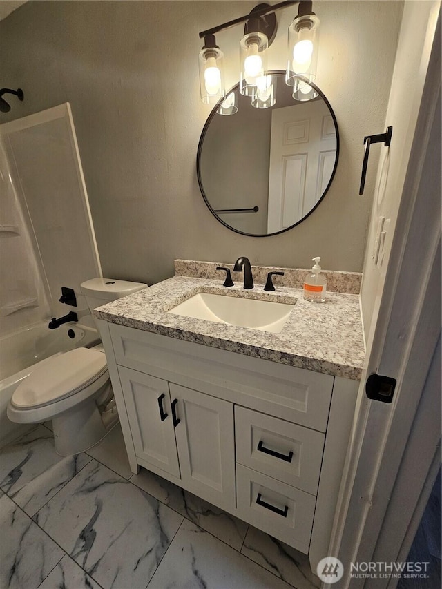 16738 2nd Ave NE, Shoreline, WA 98155 - bathroom with vanity, marble finish flooring, toilet, and shower / bathtub combination