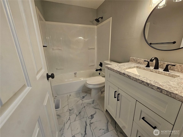 16738 2nd Ave NE, Shoreline, WA 98155 - full bathroom with marble look tile flooring, vanity, toilet, and shower / tub combination