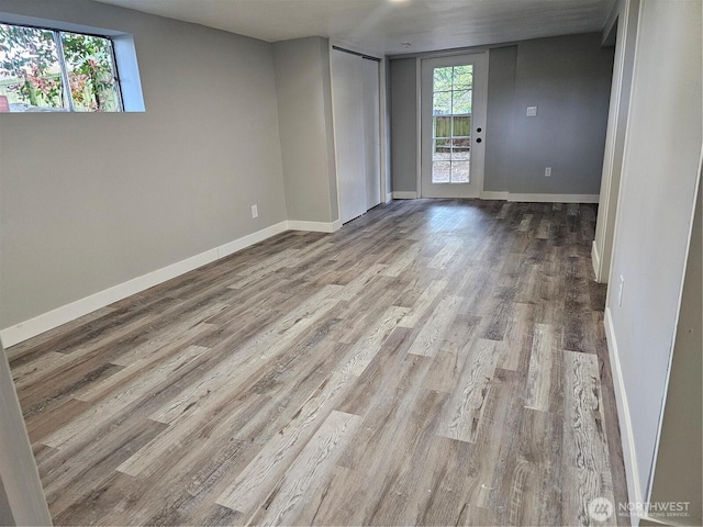 16738 2nd Ave NE, Shoreline, WA 98155 - spare room with wood finished floors and baseboards