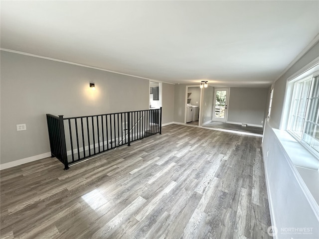 16738 2nd Ave NE, Shoreline, WA 98155 - unfurnished room with washer and dryer and wood finished floors