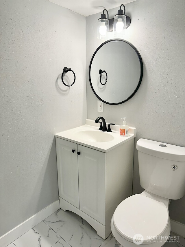 16738 2nd Ave NE, Shoreline, WA 98155 - half bathroom featuring vanity and marble finish floors