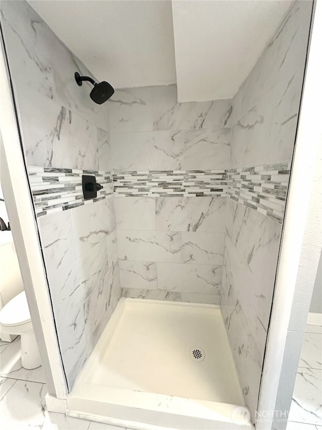 16738 2nd Ave NE, Shoreline, WA 98155 - full bathroom with marble look tile flooring and a shower stall