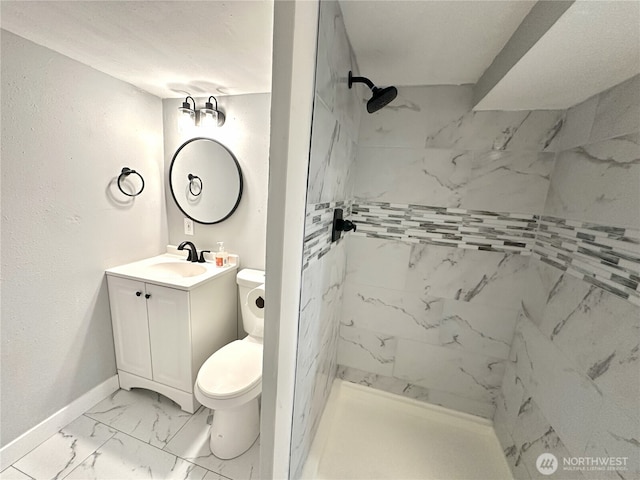 16738 2nd Ave NE, Shoreline, WA 98155 - full bath with marble look tile flooring, vanity, and a marble finish shower