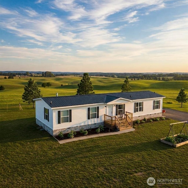 200LOTA Fineview, Chehalis, WA 98532 - manufactured / mobile home featuring crawl space, a vegetable garden, a front lawn, metal roof, and a view of rural / pastoral area