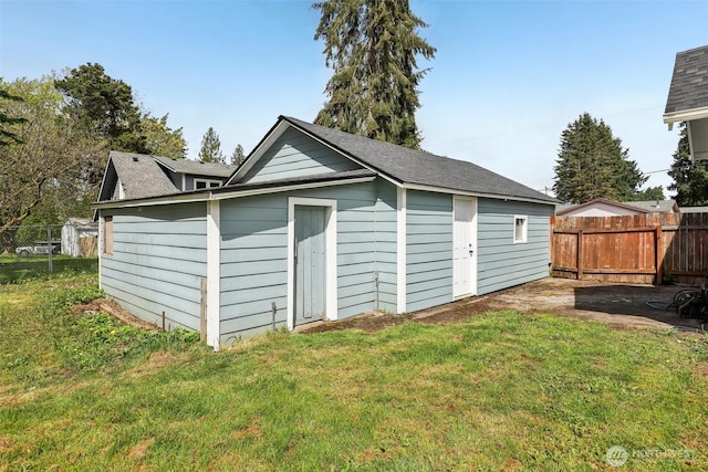 garage with fence