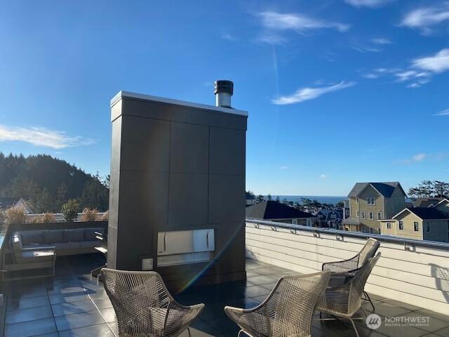 204 Market St Unit A, Pacific Beach, WA 98571 - view of patio / terrace with a balcony