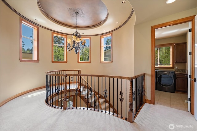 8131 116th Ave NE, Kirkland, WA 98033 - stairs featuring baseboards, a chandelier, washer / dryer, carpet flooring, and recessed lighting