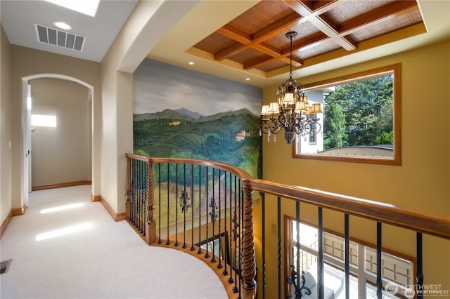 8131 116th Ave NE, Kirkland, WA 98033 - corridor featuring arched walkways, baseboards, coffered ceiling, and visible vents