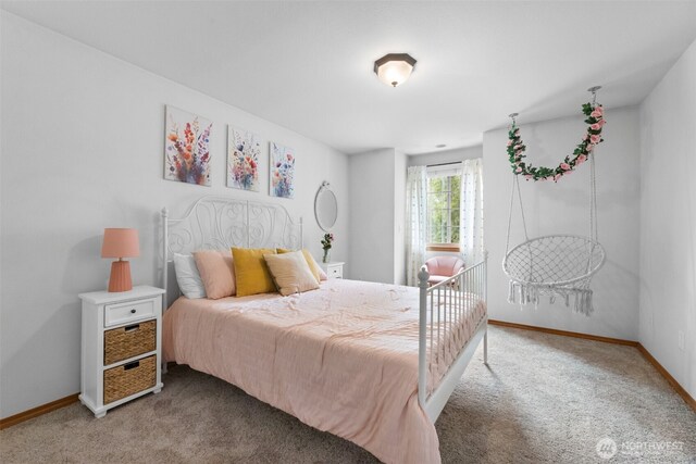 8203 32nd Ave E, Tacoma, WA 98443 - carpeted bedroom featuring baseboards