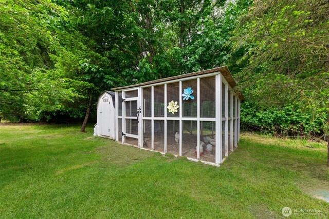 8203 32nd Ave E, Tacoma, WA 98443 - view of poultry coop featuring a yard