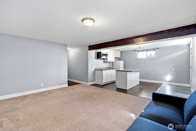 living area with baseboards