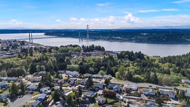 aerial view with a residential view and a water view