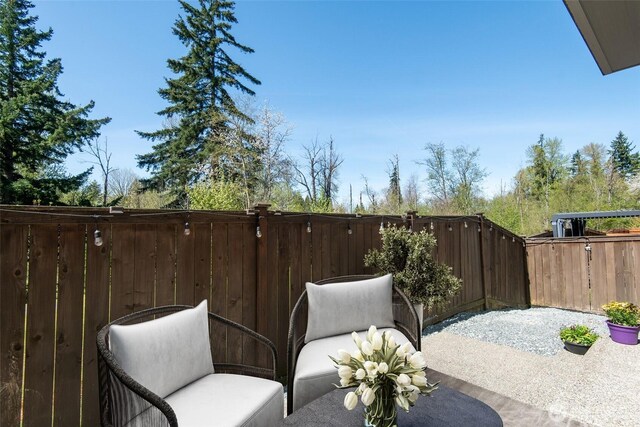 view of patio / terrace with fence