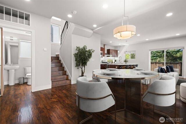 dining room featuring stairs, baseboards, dark wood-style flooring, visible vents, and recessed lighting