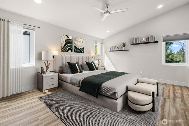 bedroom with light wood-type flooring, vaulted ceiling, and recessed lighting
